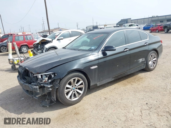 2015 BMW 5 Series 528i with VIN WBA5A5C58FD520694, listed as a IAAI auction lot 41804906 with 121,636 mi miles. Bid and sale history available at carsss.com. Image 2.