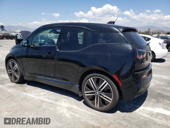 2016 BMW i3 with VIN WBY1Z4C53GV506572, listed as a Copart auction lot 63569273 with 56,936 mi miles. Bid and sale history available at carsss.com. Image 2.