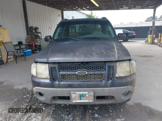 2003 Ford Explorer Sport Trac XLS z VIN 1FMZU67E33UB04832, wystawiony jako IAAI lot #42309055 z przebiegiem 149 360 mil mil oraz . Historia ofert i sprzedaży dostępna na DreamBid. Obrazek 6.