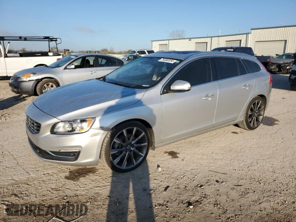 2015 Volvo V60 T5 Drive-E Premier with VIN YV140MEK6F1266526, listed as a Copart auction lot 79388354 with 127,194 mi miles and Salvage Title. Bid and sale history available at carsss.com. Image 1.