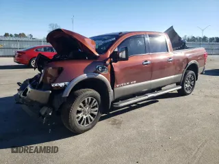 2017 Nissan Titan XD SL with VIN 1N6BA1F48HN567073, listed as a Copart auction lot 80153753 with 99,774 mi miles and Salvage Title. Bid and sale history available at carsss.com. Image 1.