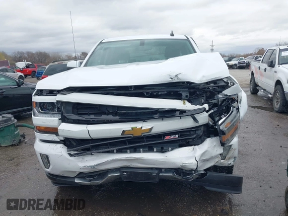 2018 Chevrolet Silverado 1500 LT with VIN 3GCUKREC3JG453433, listed as a IAAI auction lot 38138441 with 53,496 mi miles. Bid and sale history available at carsss.com. Image 6.