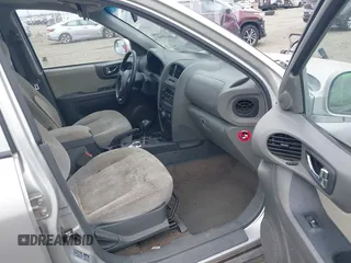 2005 Hyundai Santa Fe GLS z VIN KM8SC13E25U877937, wystawiony jako IAAI lot #42449901 z przebiegiem 150 262 mil mil oraz . Historia ofert i sprzedaży dostępna na DreamBid. Obrazek 5.
