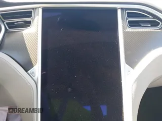 2014 Tesla Model S 60 z VIN 5YJSA1H17EFP33910, wystawiony jako IAAI lot #42346934 z przebiegiem Nie podano mil oraz . Historia ofert i sprzedaży dostępna na DreamBid. Obrazek 18.