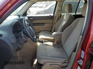2015 Jeep Patriot Latitude with VIN 1C4NJPFB8FD264556, listed as a Copart auction lot 48775935 with 147,432 mi miles and Salvage Title. Bid and sale history available at DreamBid. Image 7.