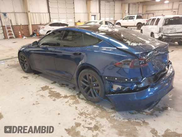 2021 Tesla Model S Plaid with VIN 5YJSA1E6XMF439884, listed as a IAAI auction lot 41622750 with Not provided miles and . Bid and sale history available at DreamBid. Image 3.