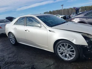 2012 Cadillac CTS Premium with VIN 1G6DP5E3XC0144157, listed as a IAAI auction lot 41311350 with 96,042 mi miles and . Bid and sale history available at DreamBid. Image 14.
