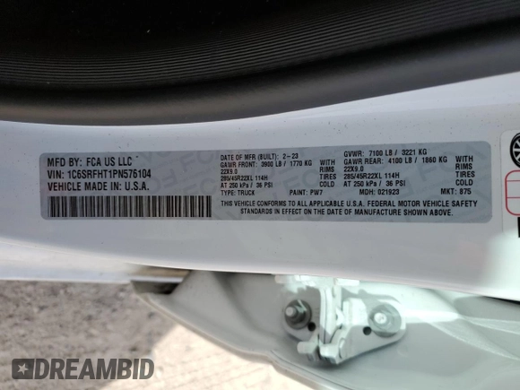 2023 Ram 1500 Limited with VIN 1C6SRFHT1PN576104, listed as a Copart auction lot 48064355 with 23,874 mi miles and Salvage title. Bid and sale history available at DreamBid. Image 13.
