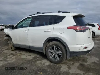 2018 Toyota RAV4 XLE with VIN 2T3WFREV1JW471752, listed as a Copart auction lot 46952565 with 87,705 mi miles and Salvage Title. Bid and sale history available at DreamBid. Image 2.