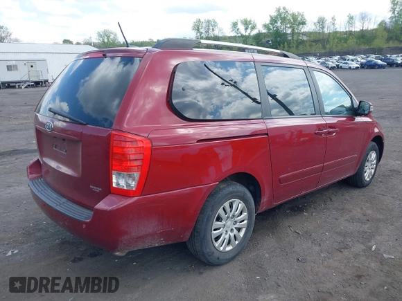 2012 Kia Sedona LX with VIN KNDMG4C76C6453523, listed as a IAAI auction lot 42189376 with 207,557 mi miles. Bid and sale history available at carsss.com. Image 4.