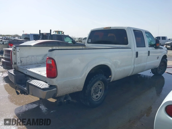 2015 Ford F-350 XL with VIN 1FT7W3AT0FEB56493, listed as a IAAI auction lot 41629744 with 261,988 mi miles and . Bid and sale history available at DreamBid. Image 4.