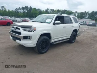 2014 Toyota 4Runner Limited with VIN JTEBU5JR4E5185764, listed as a IAAI auction lot 42117308 with 199,477 mi miles. Bid and sale history available at carsss.com. Image 2.