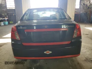 2008 Suzuki Forenza z VIN KL5JD56Z98K859749, wystawiony jako Copart lot #77630514 z przebiegiem 202 609 mil mil oraz Szkody całkowita. Historia ofert i sprzedaży dostępna na DreamBid. Obrazek 6.