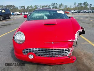 2002 Ford Thunderbird Hardtop Premium with VIN 1FAHP60A02Y130882, listed as a IAAI auction lot 41911737 with 18,521 mi miles and . Bid and sale history available at DreamBid. Image 13.