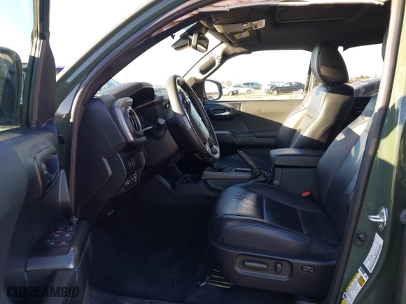 2021 Toyota Tacoma 4WD SR with VIN 3TMCZ5AN4MM401998, listed as a IAAI auction lot 41712813 with 91,371 mi miles. Bid and sale history available at carsss.com. Image 5.