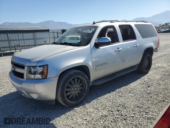 2013 Chevrolet Suburban LT with VIN 1GNSCJE05DR371789, listed as a Copart auction lot 60755775 with 233,275 mi miles and Salvage title. Bid and sale history available at DreamBid. Image 1.