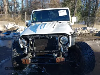 2014 Jeep Wrangler Unlimited Sahara with VIN 1C4HJWEG2EL273813, listed as a IAAI auction lot 41311011 with 96,104 mi miles. Bid and sale history available at carsss.com. Image 12.