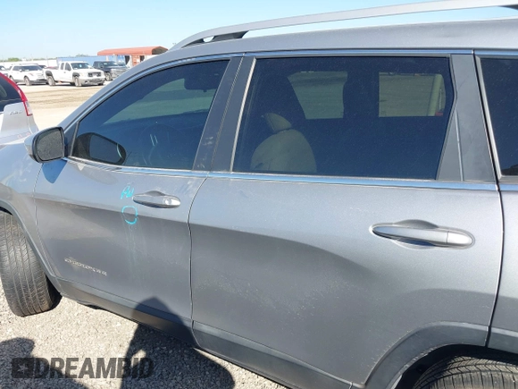 2017 Jeep Cherokee Latitude with VIN 1C4PJLCBXHW573751, listed as a IAAI auction lot 42220184 with 127,362 mi miles and . Bid and sale history available at DreamBid. Image 14.
