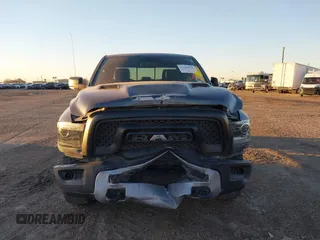 2017 Ram 1500 Rebel z VIN 1C6RR7YT0HS534465, wystawiony jako IAAI lot #41240431 z przebiegiem 125 886 mil mil oraz . Historia ofert i sprzedaży dostępna na DreamBid. Obrazek 12.