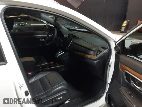 2021 Honda CR-V Touring with VIN 7FART6H98ME024238, listed as a IAAI auction lot 42341911 with 50,757 mi miles and . Bid and sale history available at DreamBid. Image 5.