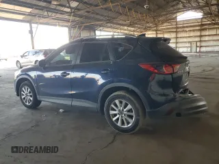 2016 Mazda CX-5 Touring with VIN JM3KE2CY7G0653854, listed as a Copart auction lot 74825564 with 139,193 mi miles and Salvage Title. Bid and sale history available at DreamBid. Image 2.