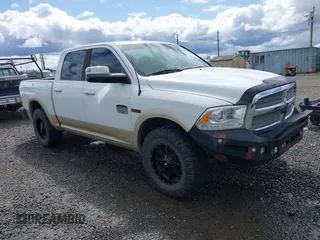2014 Ram 1500 Longhorn with VIN 1C6RR7PM8ES361624, listed as a IAAI auction lot 41916553 with 151,509 mi miles and . Bid and sale history available at DreamBid. Image 1.