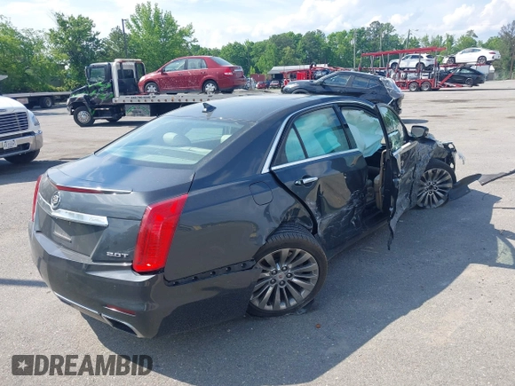 2014 Cadillac CTS Luxury AWD z VIN 1G6AX5SX7E0173466, wystawiony jako IAAI lot #42187266 z przebiegiem 115 140 mil mil oraz . Historia ofert i sprzedaży dostępna na DreamBid. Obrazek 4.