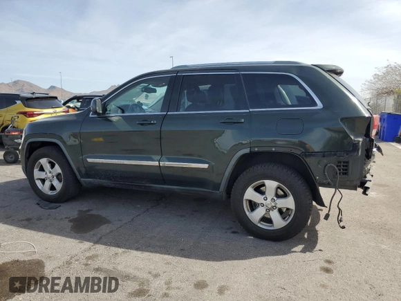 2011 Jeep Grand Cherokee Laredo with VIN 1J4RR4GG2BC636423, listed as a Copart auction lot 51169135 with 143,058 mi miles and Salvage Title. Bid and sale history available at DreamBid. Image 2.