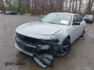 2020 Dodge Charger SXT with VIN 2C3CDXBG6LH234541, listed as a IAAI auction lot 41853444 with 119,582 mi miles. Bid and sale history available at carsss.com. Image 2.
