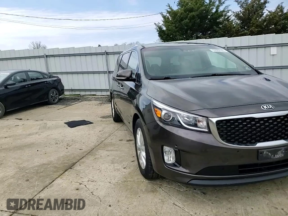 2017 Kia Sedona EX with VIN KNDMC5C16H6253083, listed as a Copart auction lot 52282985 with 80,259 mi miles and Salvage Title. Bid and sale history available at DreamBid. Image 12.
