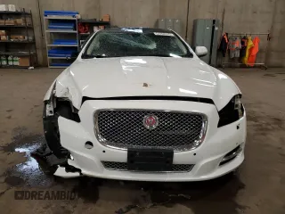 2014 Jaguar XJ Portfolio with VIN SAJWJ2GD2E8V69597, listed as a Copart auction lot 57798145 with 100,857 mi miles and Salvage title. Bid and sale history available at DreamBid. Image 5.