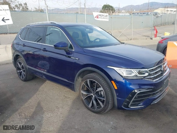 2022 Volkswagen Tiguan SEL R-Line with VIN 3VV4B7AX3NM154238, listed as a IAAI auction lot 40995659 with 23,437 mi miles. Bid and sale history available at carsss.com. Image 1.