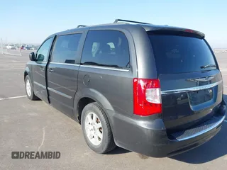 2011 Chrysler Town & Country Touring with VIN 2A4RR5DG6BR782499, listed as a IAAI auction lot 42063944 with 165,647 mi miles and . Bid and sale history available at DreamBid. Image 3.