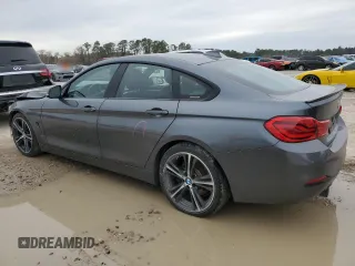 2018 BMW 4 Series 440i with VIN WBA4J5C53JBF07516, listed as a Copart auction lot 86118784 with 154,460 mi miles and Salvage Title. Bid and sale history available at DreamBid. Image 2.