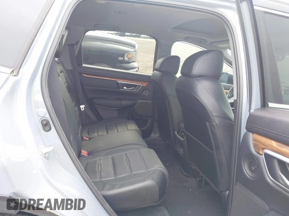 2021 Honda CR-V Touring with VIN 7FART6H91ME022993, listed as a IAAI auction lot 42439344 with 30,477 mi miles and . Bid and sale history available at DreamBid. Image 8.