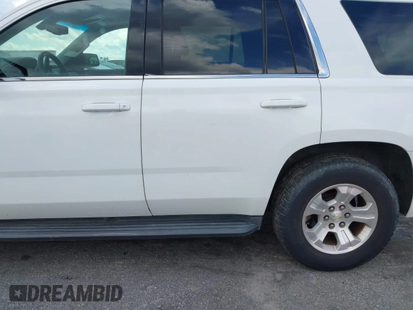 2015 Chevrolet Tahoe Commercial z VIN 1GNLC2EC1FR721538, wystawiony jako IAAI lot #42274601 z przebiegiem 138 991 mil mil oraz . Historia ofert i sprzedaży dostępna na DreamBid. Obrazek 19.