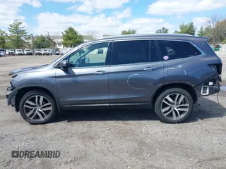 2016 Honda Pilot Elite with VIN 5FNYF6H06GB058392, listed as a IAAI auction lot 41983804 with 103,304 mi miles. Bid and sale history available at carsss.com. Image 15.