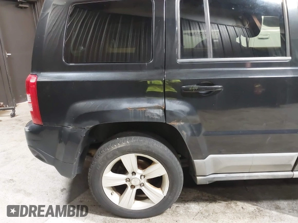 2011 Jeep Patriot Latitude with VIN 1J4NF1GB3BD105607, listed as a IAAI auction lot 42084734 with 173,377 mi miles and . Bid and sale history available at DreamBid. Image 18.