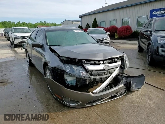2012 Ford Fusion SEL z VIN 3FAHP0JA3CR106622, wystawiony jako Copart lot #56330425 z przebiegiem 120 880 mil mil oraz Szkoda całkowita • Salvage title. Historia ofert i sprzedaży dostępna na DreamBid. Obrazek 14.