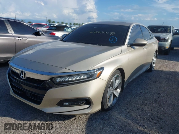 2020 Honda Accord Touring with VIN 1HGCV2F99LA029545, listed as a IAAI auction lot 40472177 with 44,960 mi miles and . Bid and sale history available at DreamBid. Image 2.