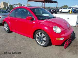 2002 Volkswagen Beetle GLX z VIN 3VWDD21C82M410830, wystawiony jako IAAI lot #42292655 z przebiegiem 82 262 mil mil oraz . Historia ofert i sprzedaży dostępna na DreamBid. Obrazek 1.