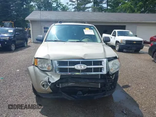 2012 Ford Escape XLT with VIN 1FMCU0D77CKB01050, listed as a IAAI auction lot 42513535 with 190,526 mi miles and . Bid and sale history available at DreamBid. Image 13.