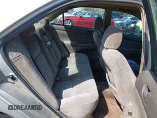 2003 Toyota Camry LE z VIN 4T1BF32K93U053750, wystawiony jako IAAI lot #41930830 z przebiegiem Nie podano mil oraz . Historia ofert i sprzedaży dostępna na DreamBid. Obrazek 8.