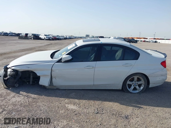 2014 BMW 3 Series 328i with VIN WBA3A5G5XENP32345, listed as a IAAI auction lot 42303835 with 100,235 mi miles and . Bid and sale history available at DreamBid. Image 14.