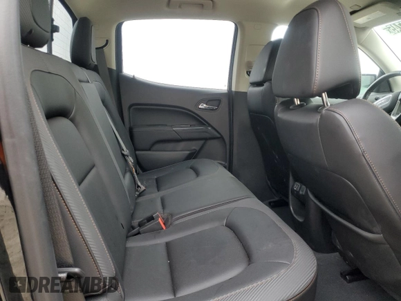 2021 GMC Canyon 4WD AT4 z VIN 1GTG6FEN9M1192443, wystawiony jako Copart lot #54955745 z przebiegiem 1544 mil mil oraz Tytuł czysty. Historia ofert i sprzedaży dostępna na DreamBid. Obrazek 10.