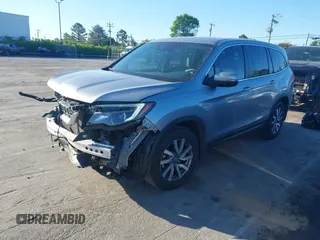 2020 Honda Pilot EX-L z VIN 5FNYF5H51LB016163, wystawiony jako IAAI lot #42030430 z przebiegiem 65 383 mil mil oraz . Historia ofert i sprzedaży dostępna na DreamBid. Obrazek 19.