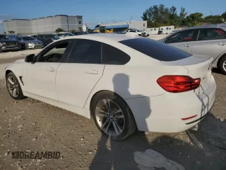 2015 BMW 4 Series 428i with VIN WBA4A5C50FG052177, listed as a Copart auction lot 86093994 with 127,956 mi miles and Salvage Title. Bid and sale history available at DreamBid. Image 2.
