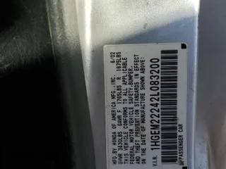 2002 Honda Civic DX z VIN 1HGEM22242L083200, wystawiony jako Copart lot #49098485 z przebiegiem 108 811 mil mil oraz Szkoda całkowita • Salvage title. Historia ofert i sprzedaży dostępna na DreamBid. Obrazek 13.