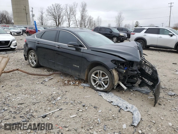 2016 Ford Fusion Titanium Hybrid z VIN 3FA6P0RU6GR139495, wystawiony jako Copart lot #52381235 z przebiegiem 138 534 mil mil oraz Czysty tytuł • Clean title. Historia ofert i sprzedaży dostępna na DreamBid. Obrazek 4.