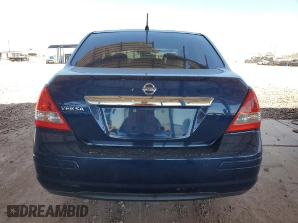 2009 Nissan Versa S z VIN 3N1BC11E89L399629, wystawiony jako Copart lot #57353335 z przebiegiem 169 245 mil mil oraz Szkoda całkowita • Salvage title. Historia ofert i sprzedaży dostępna na DreamBid. Obrazek 6.